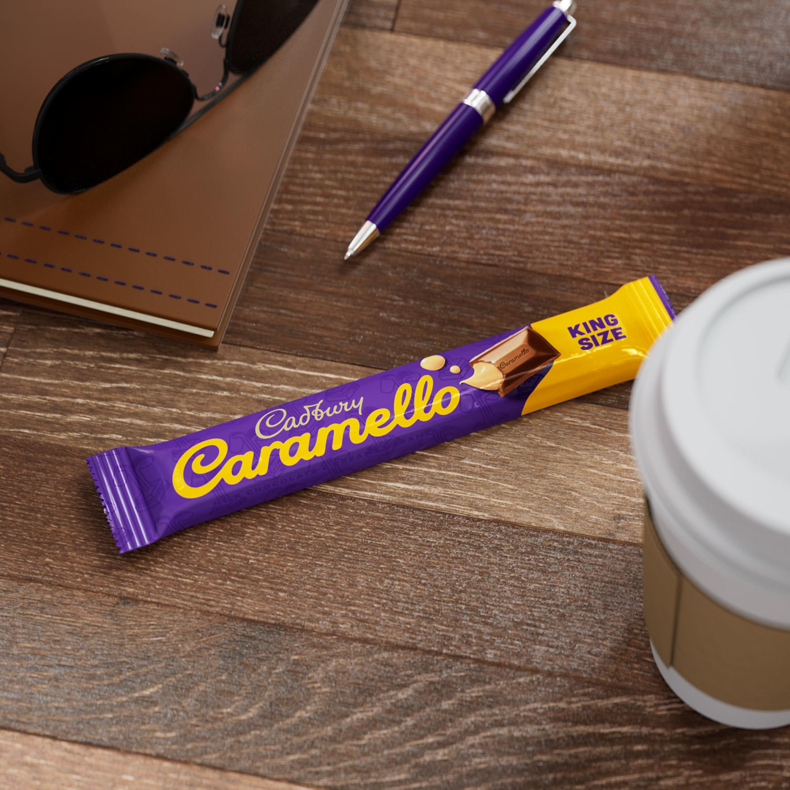 Cadbury Caramello bars in a desk drawer, ready for quick snacking.
