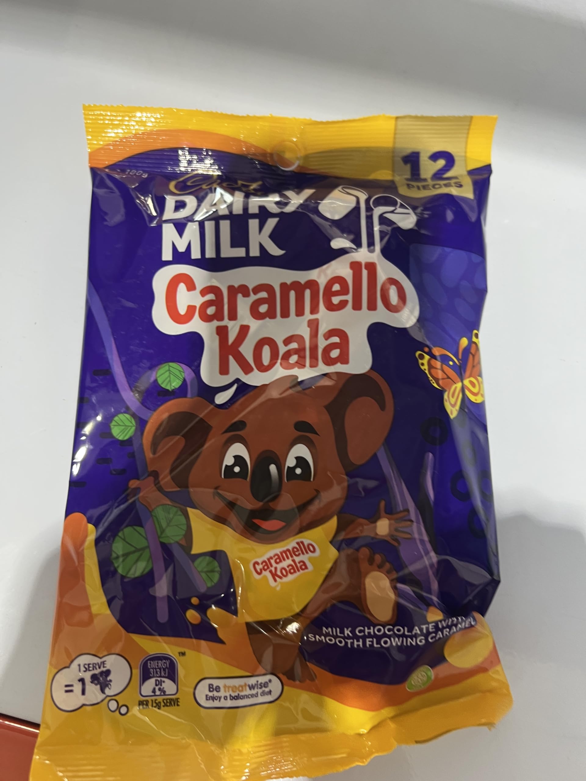 Cadbury Caramello Koala koala character image invites playful snacking.