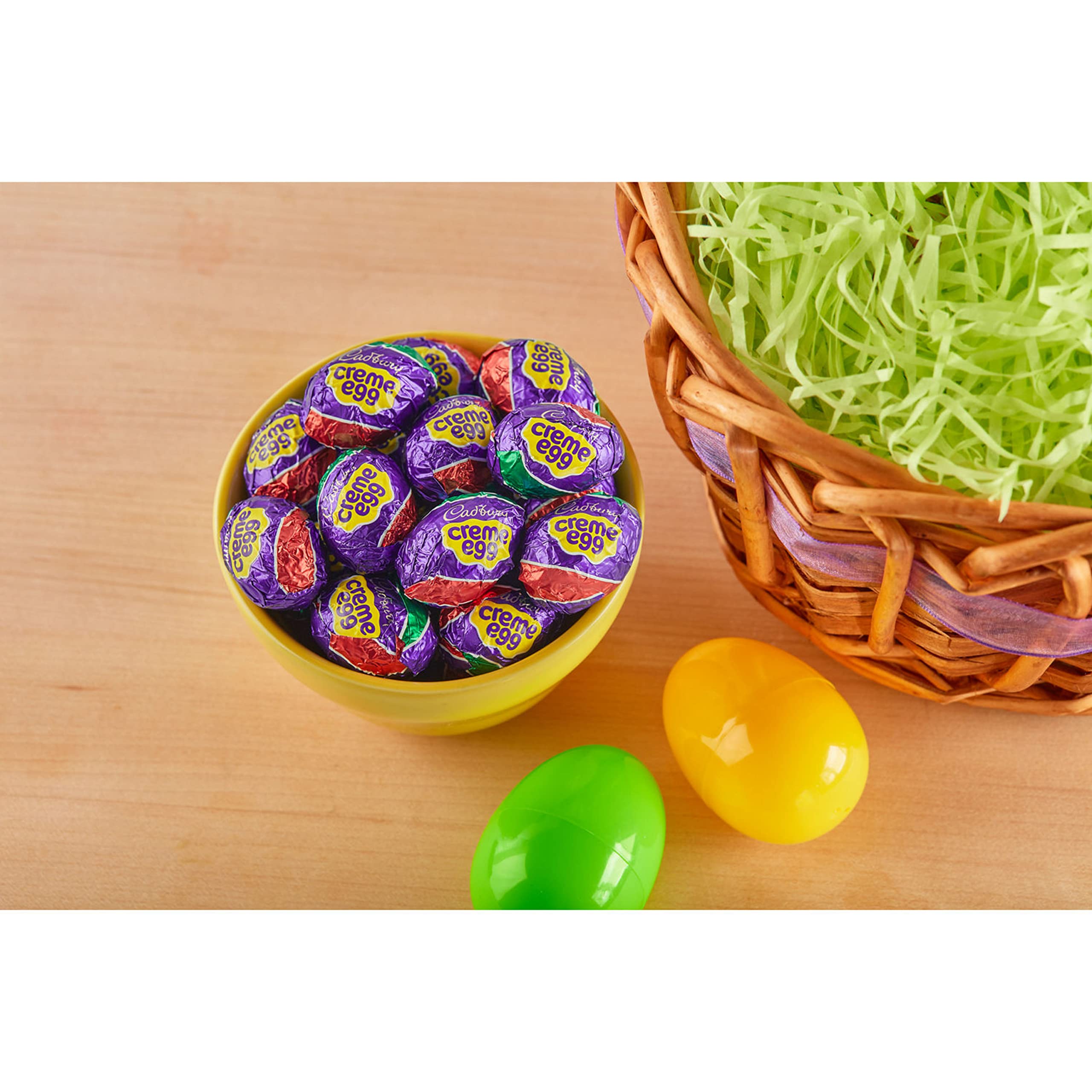 Cadbury Creme Egg on a festive table all set for Easter treats.