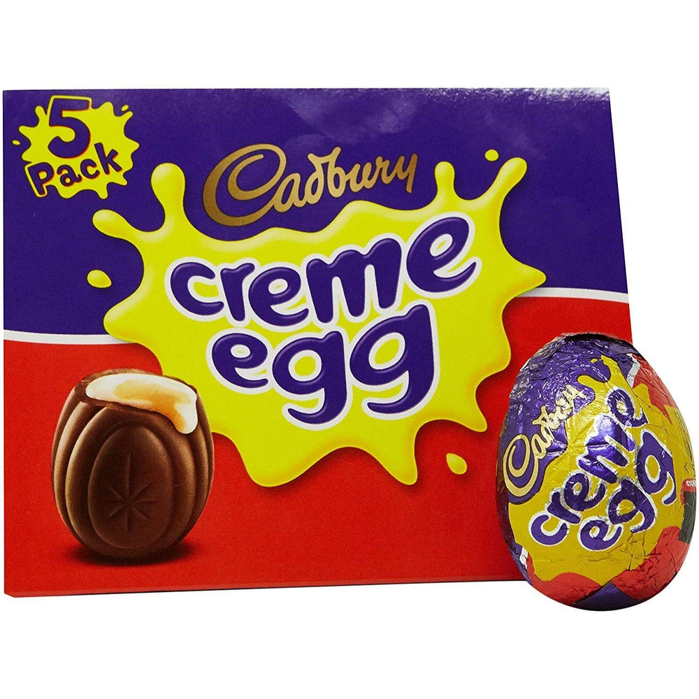 Cadbury Creme Eggs milk chocolate shell close-up, creamy exterior for chocolate lovers.