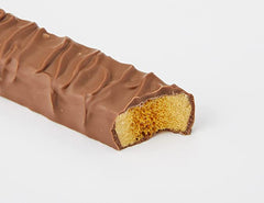 Cadbury Crunchie honeycomb center visible, crunchy interior meets creamy chocolate
