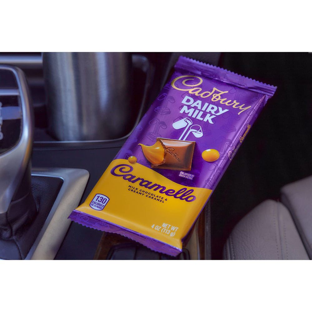 Cadbury Caramello bars on desk, easy snack during long workdays.