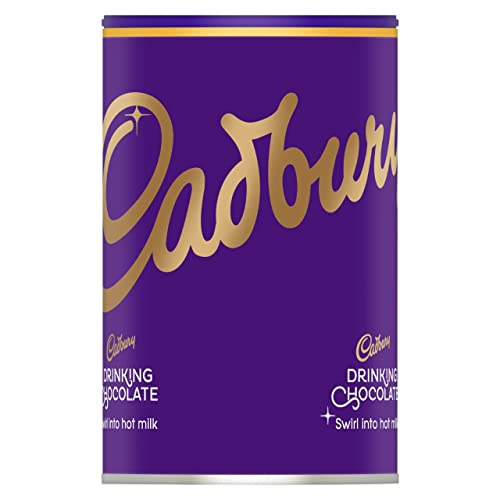 Cadbury Drinking Chocolate shown with three teaspoons stirred into hot milk.