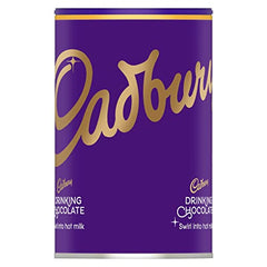 Cadbury Drinking Chocolate shown with three teaspoons stirred into hot milk.