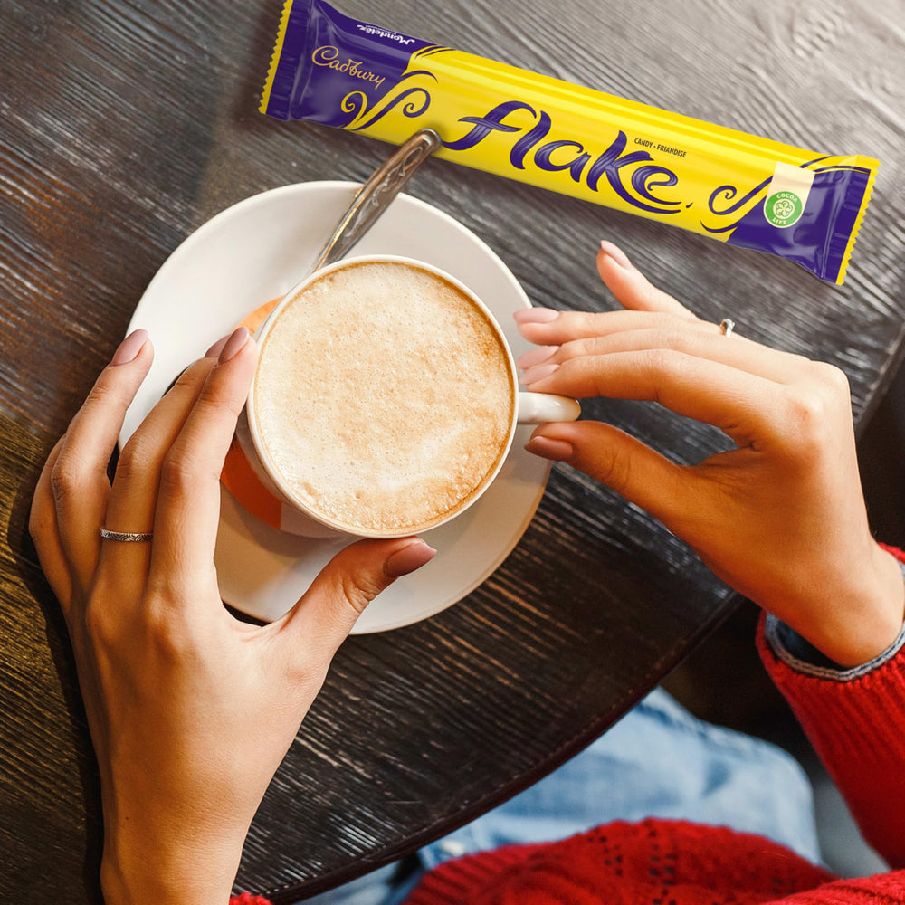 Cadbury Flake Bar crumble close-up, delicate texture and melt-in-your-mouth moment.