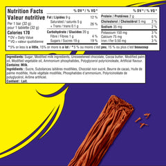Close-up of Cadbury Flake Bar unwrapped, crumbly texture for an indulgent bite.