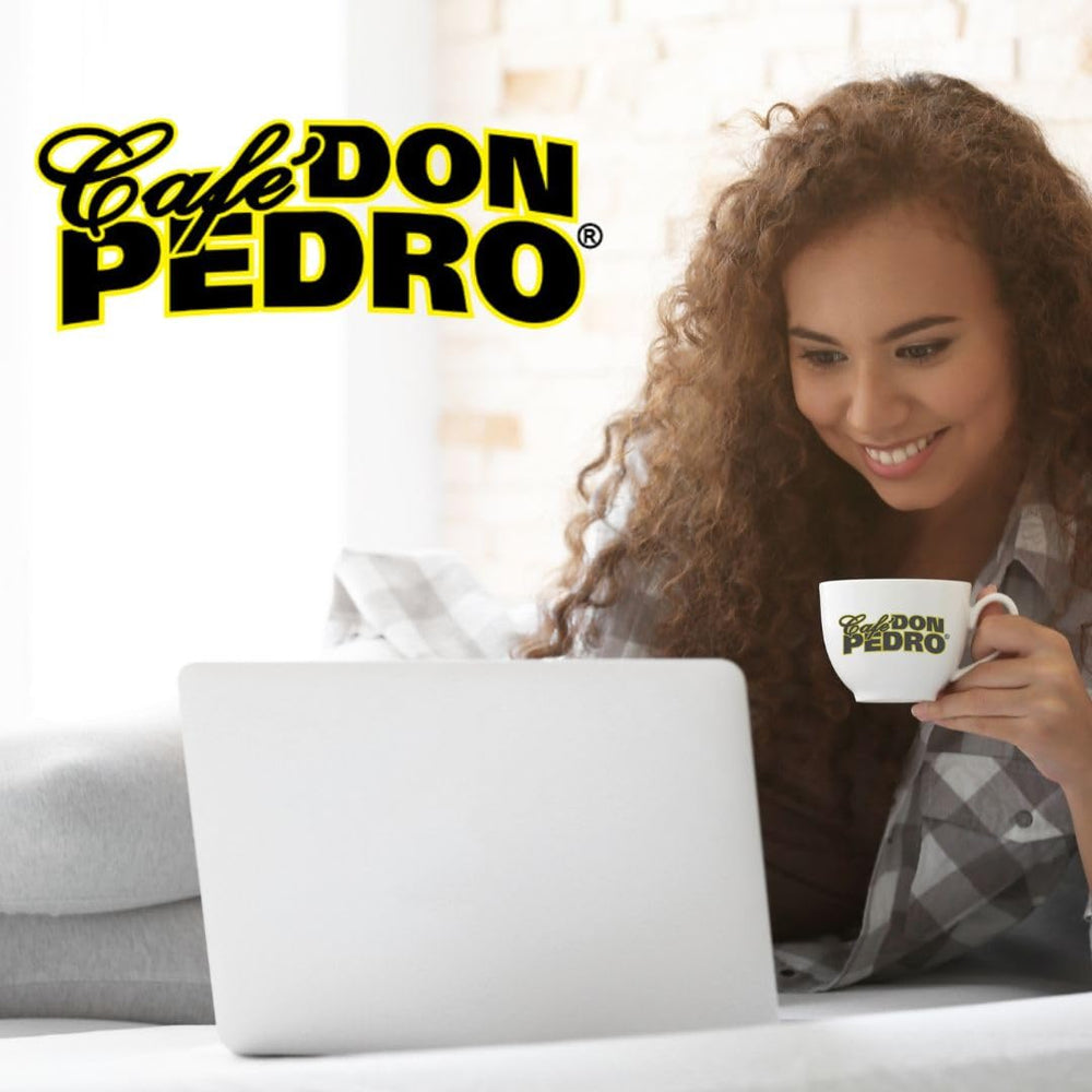 Close-up of Cafe Don Pedro ground coffee texture highlighting smooth, low-acid quality.