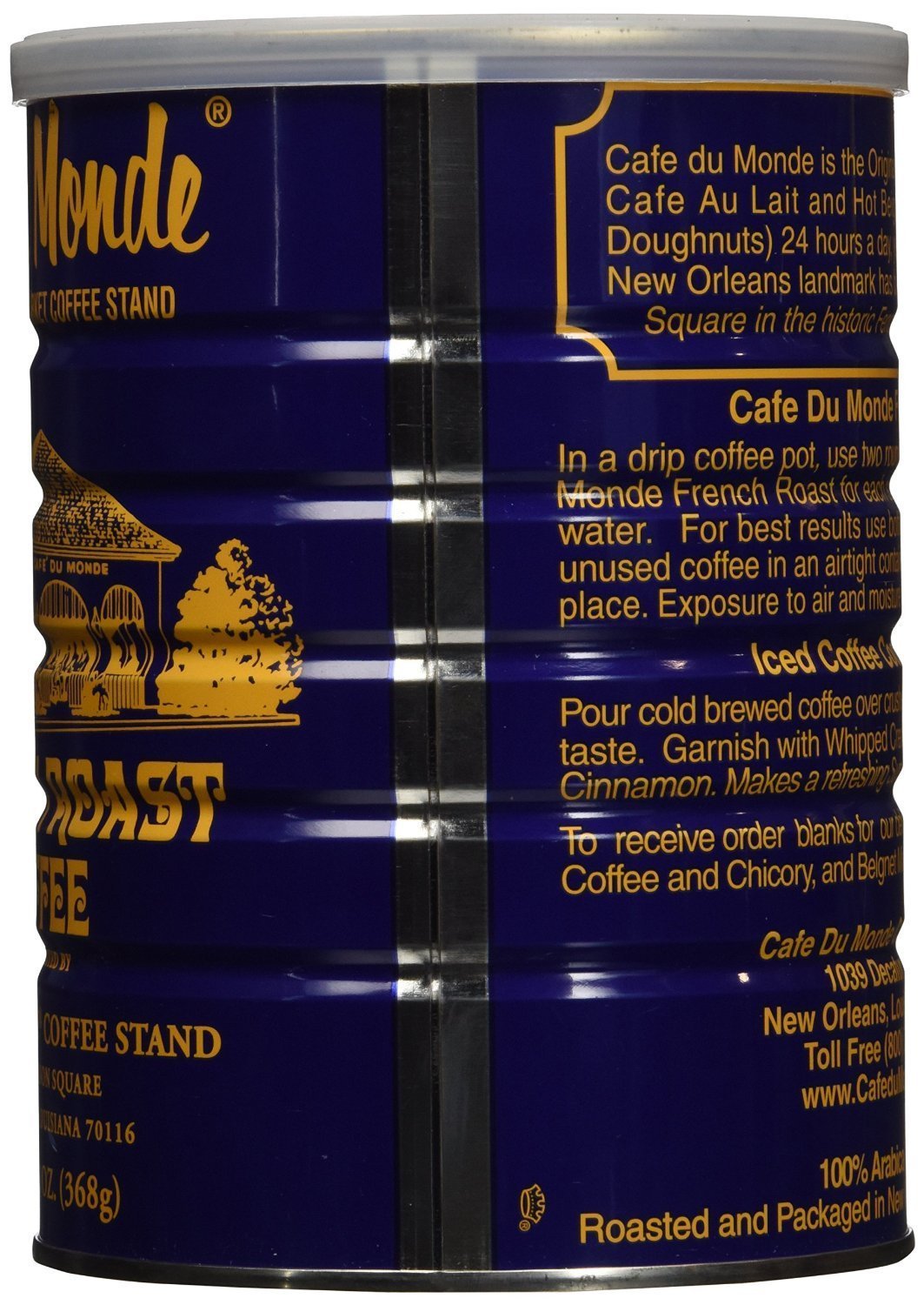 Cafe Du Monde dark roast chicory coffee can exudes bold aroma beside a steaming mug.