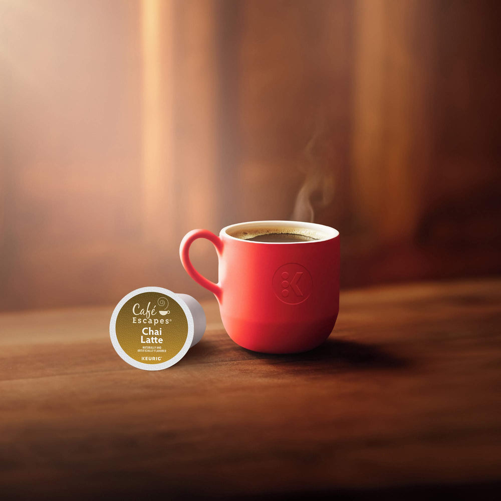 Café Escapes Chai Latte packaging back with recyclable pod info for eco-friendly choice.