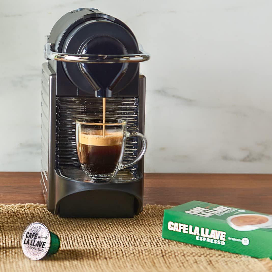 Cafe La Llave decaf pods on a kitchen counter for daily use.