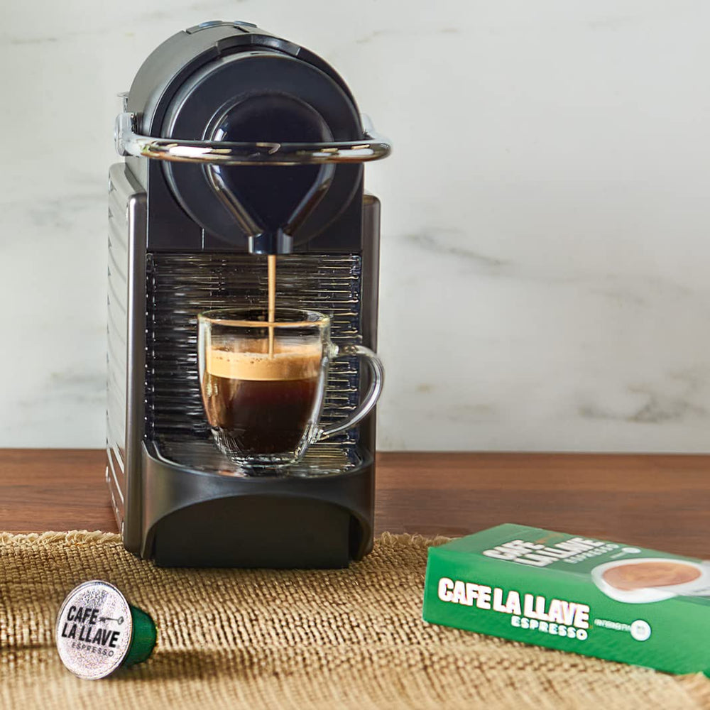 Cafe La Llave decaf pods on a kitchen counter for daily use.