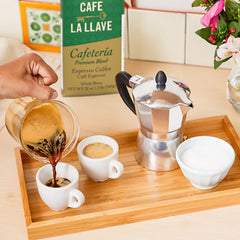 Cafe La Llave grounds prepared to optimize extraction for rich crema