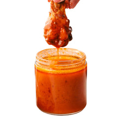 Cajun Chef Louisiana Hot Sauce label closeup; authentic ingredients and mild heat highlight flavor.