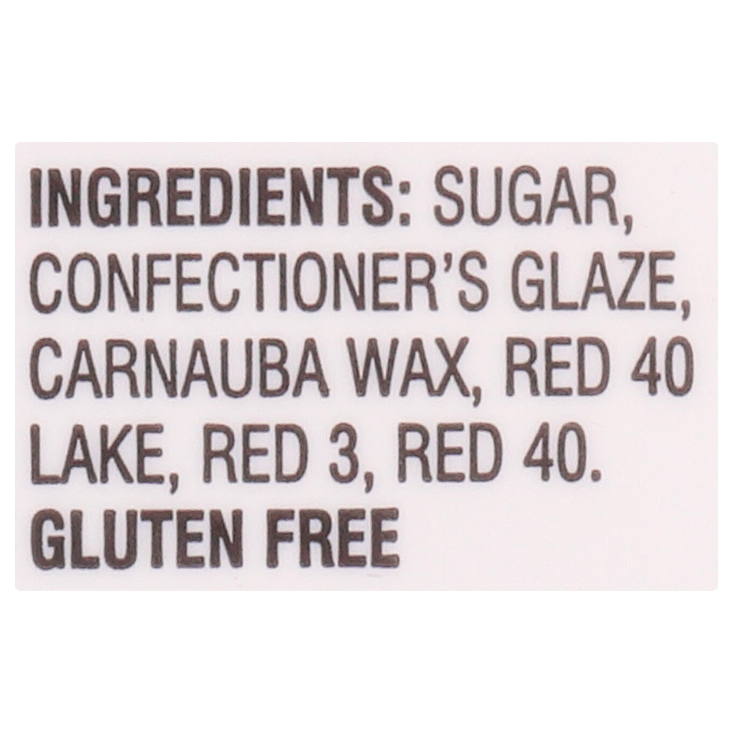 Cake decorating scene featuring Cake Mate Christmas Red Sugar for bold accents