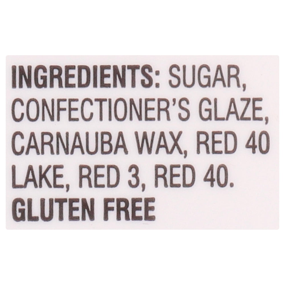 Cake decorating scene featuring Cake Mate Christmas Red Sugar for bold accents