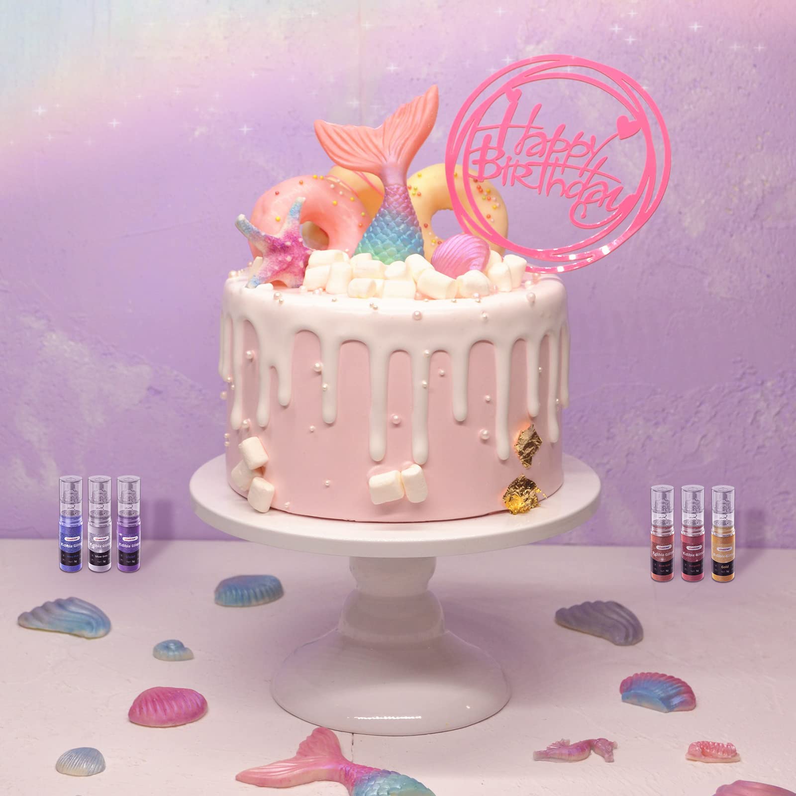 CAKESTAR edible glitter spray blue offers cool shimmering accents for cakes and cocktails.
