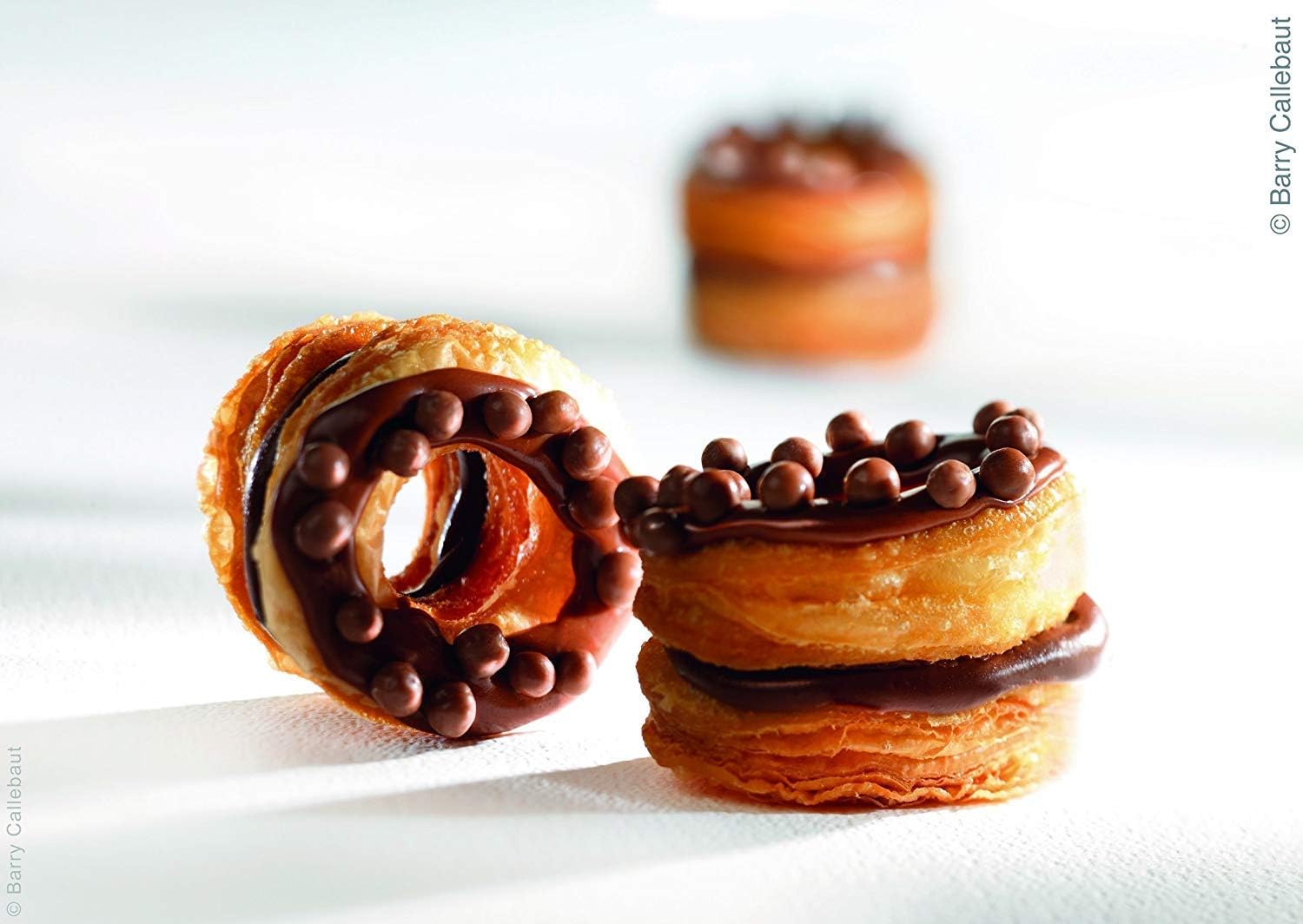 Ganache prepared with Callebaut 70% callets on a dessert plate.