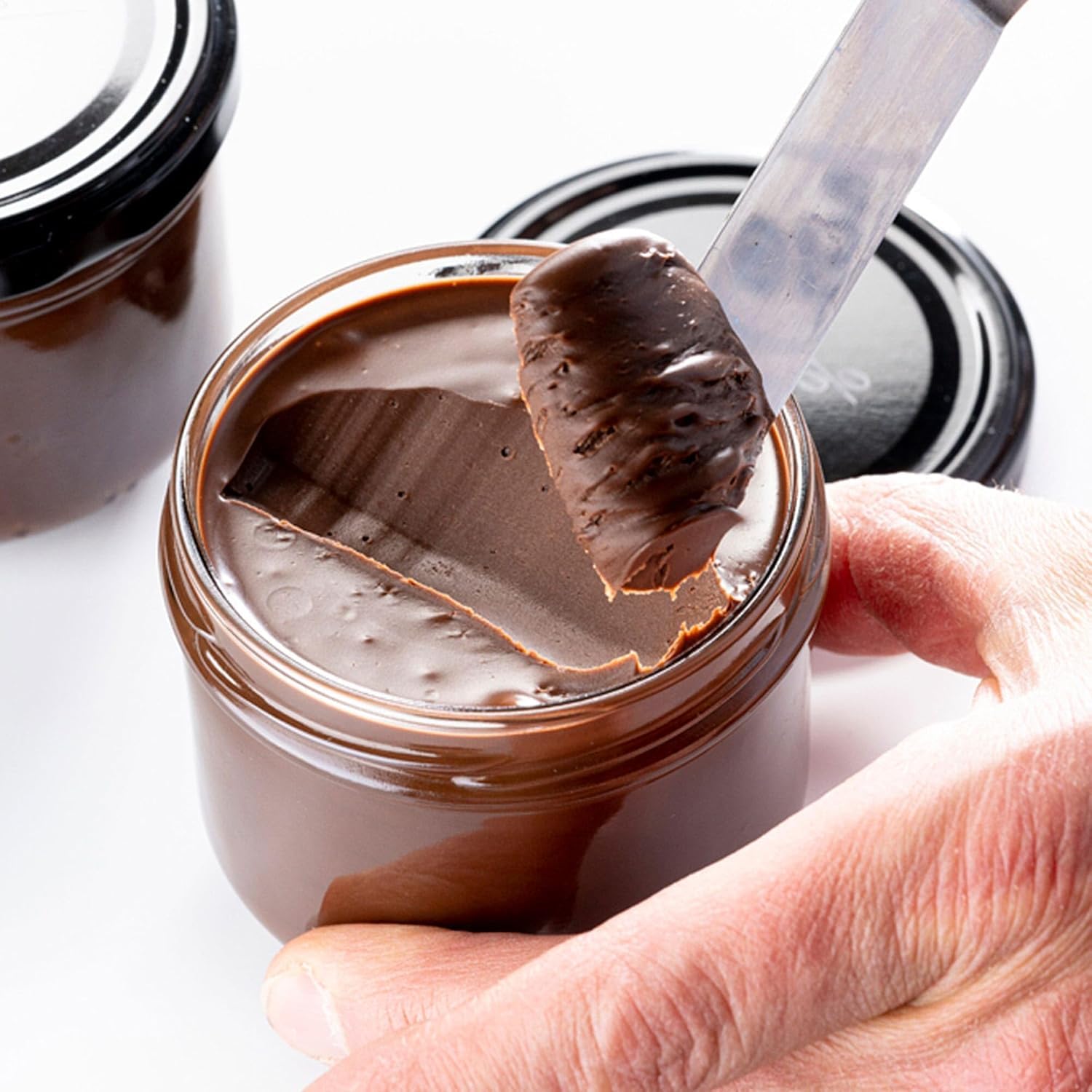 Callebaut cocoa powder scoop ready for whipping creams and desserts