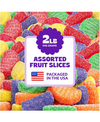 Cambie fruit slices gummy candy assortment in vibrant colors, perfect for party tables and jars.