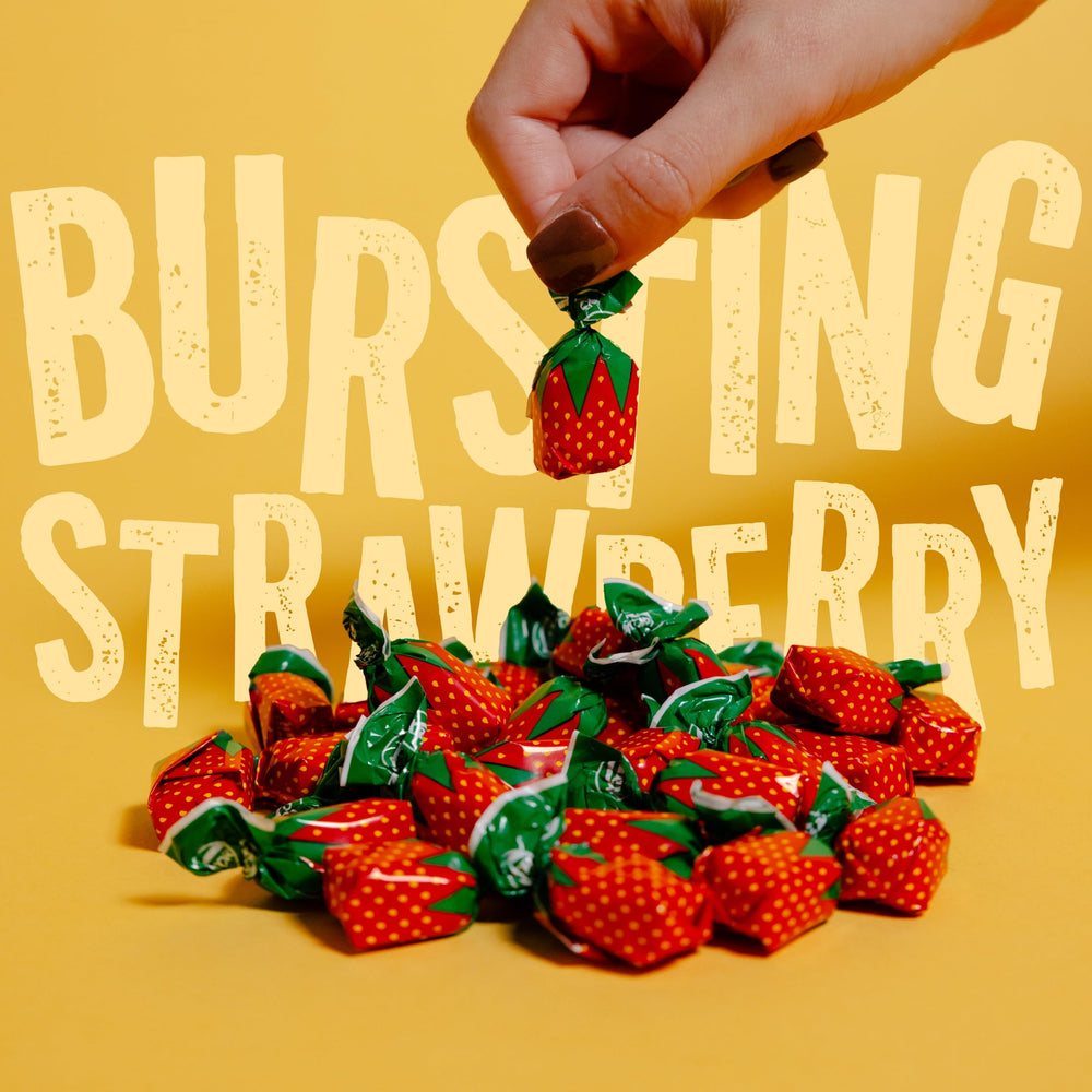 Cambie strawberry hard candy with soft center reveals chewy strawberry filling