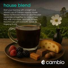 Cambio Roasters beans beside the pod highlight premium organic coffee at home.