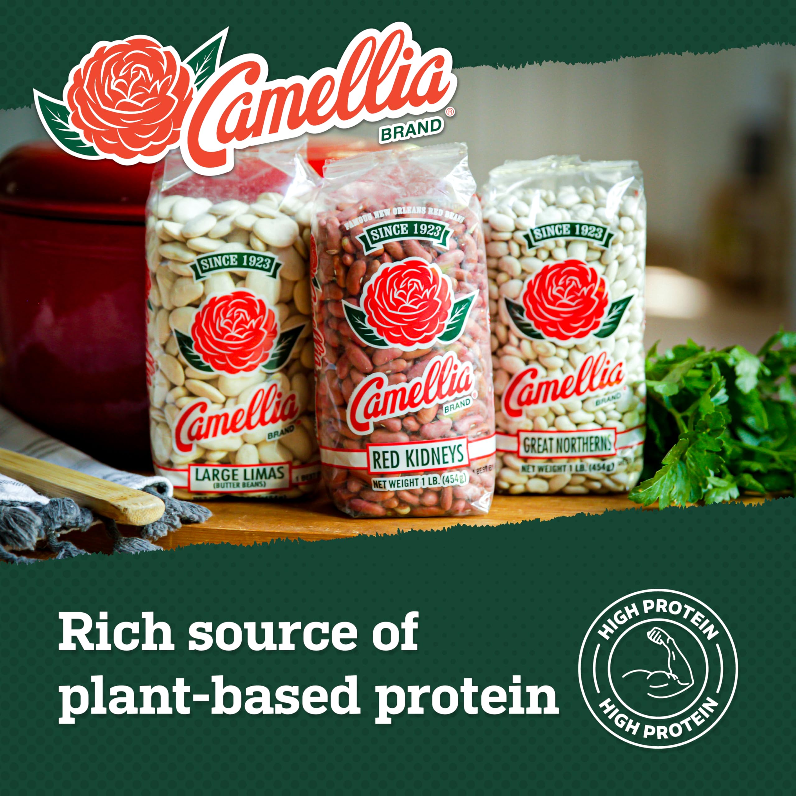 Camellia Brand navy beans simmering in a soup pot with steam.