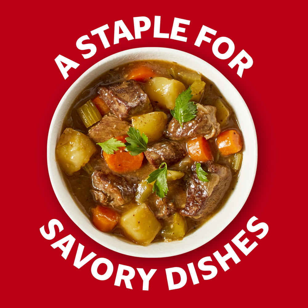 Campbell's Beef Broth pour into pot, ready to enrich recipes.