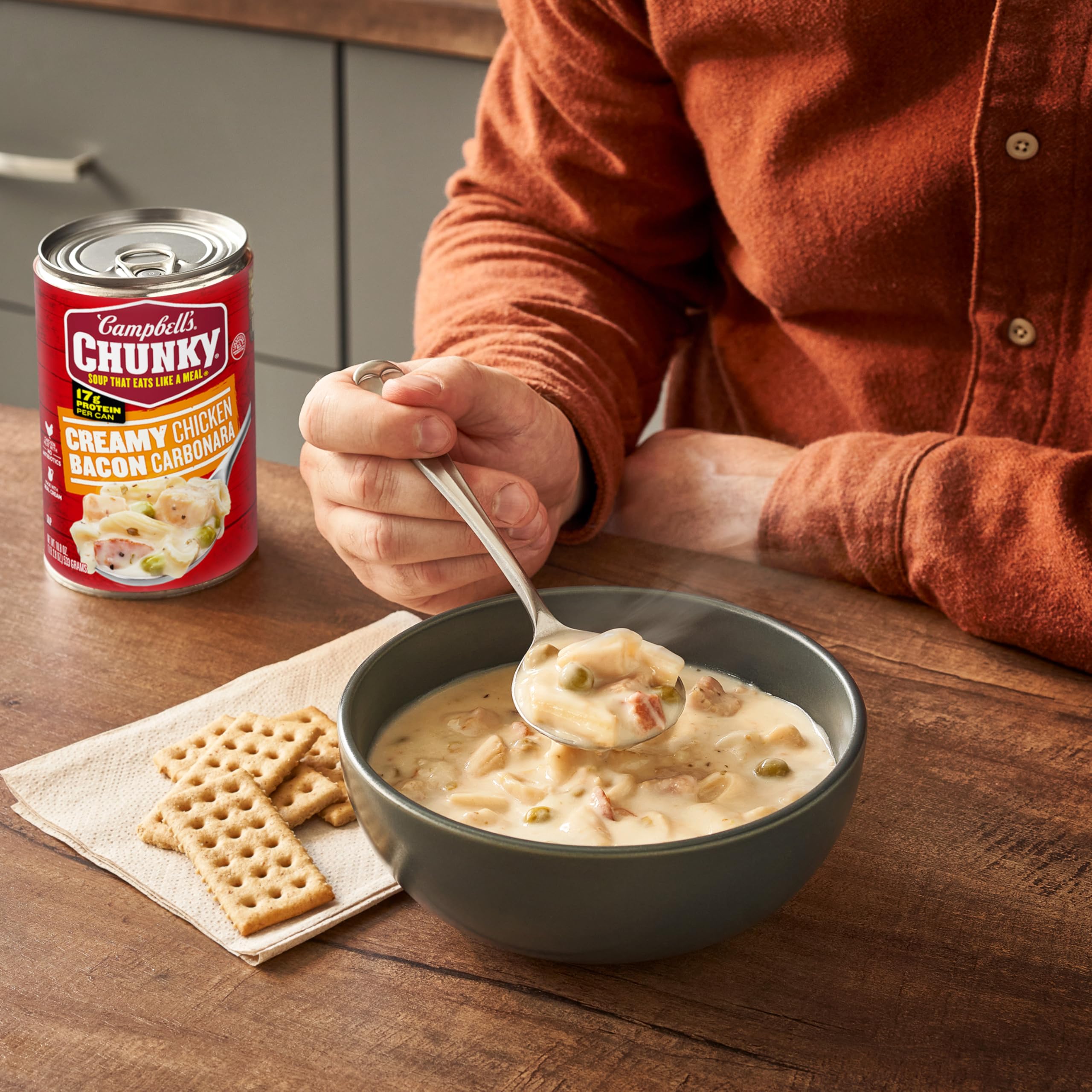 Close-up of bacon bits in Campbell's Chunky Creamy Chicken Carbonara.