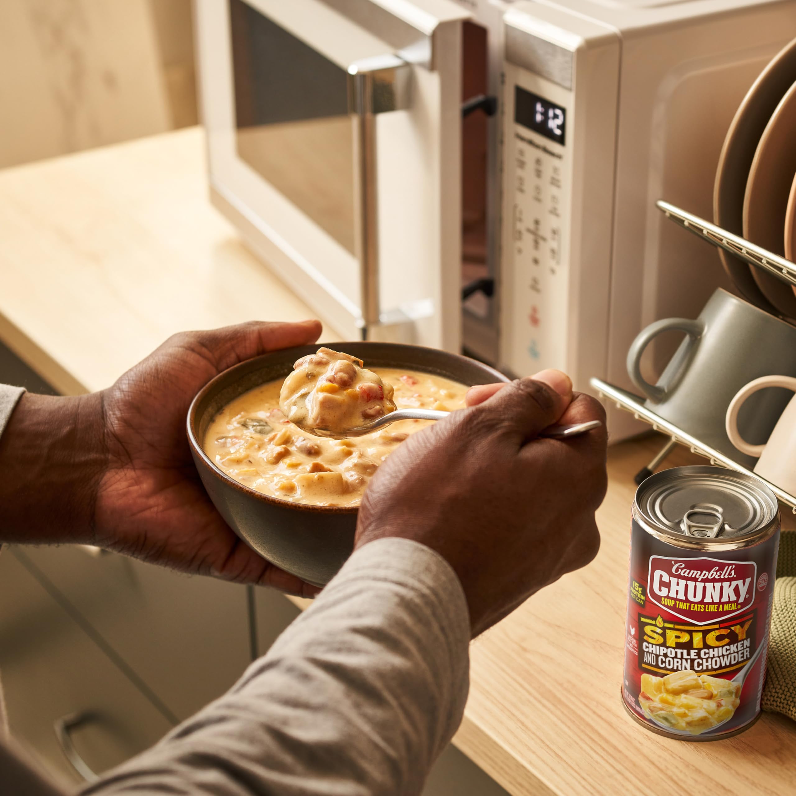 Campbell's Chipotle Chicken Corn Chowder steaming-bowl served scene conveys warm, comforting aroma.