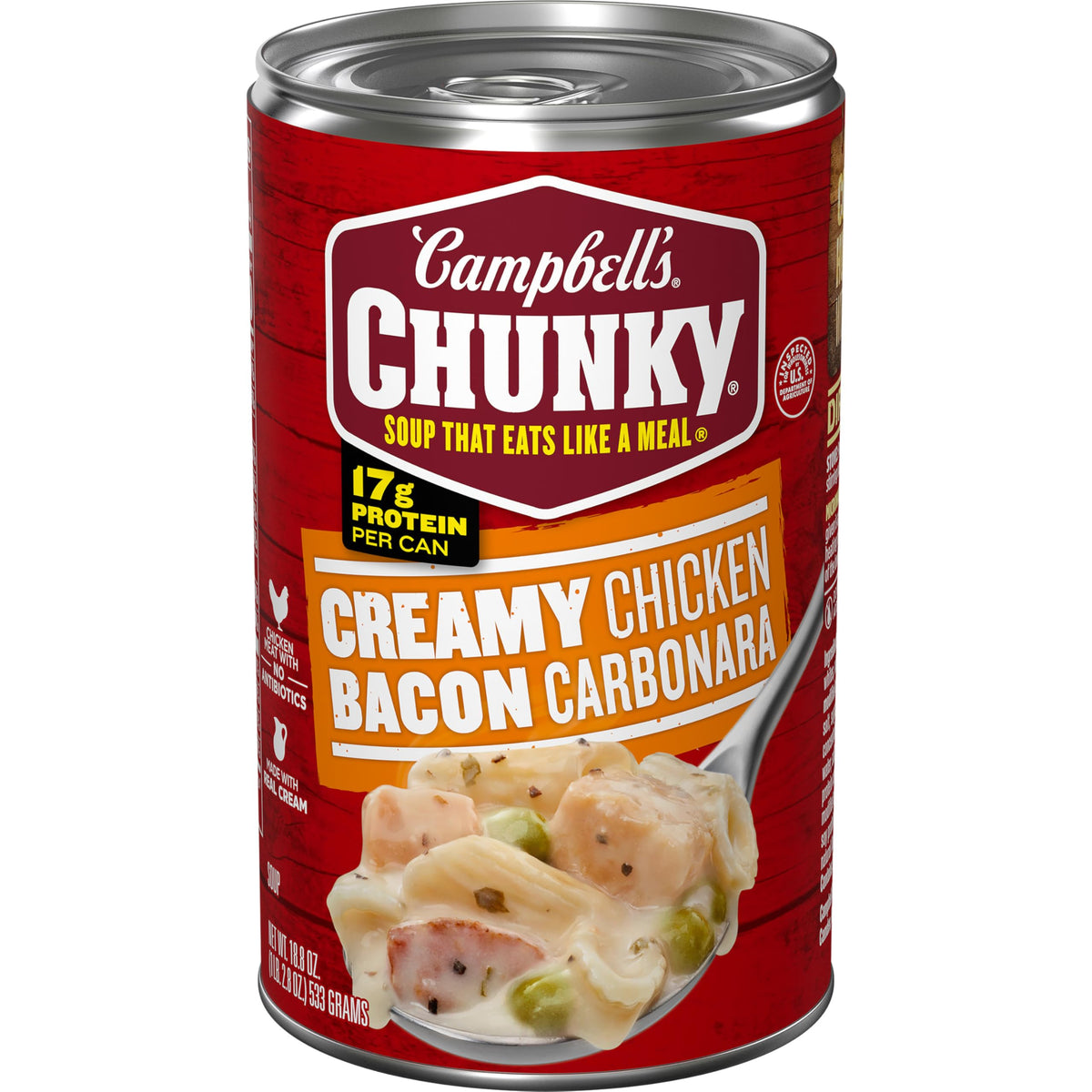 Campbell's Chunky Creamy Chicken Bacon Carbonara can on table, showcasing its protein-packed option.