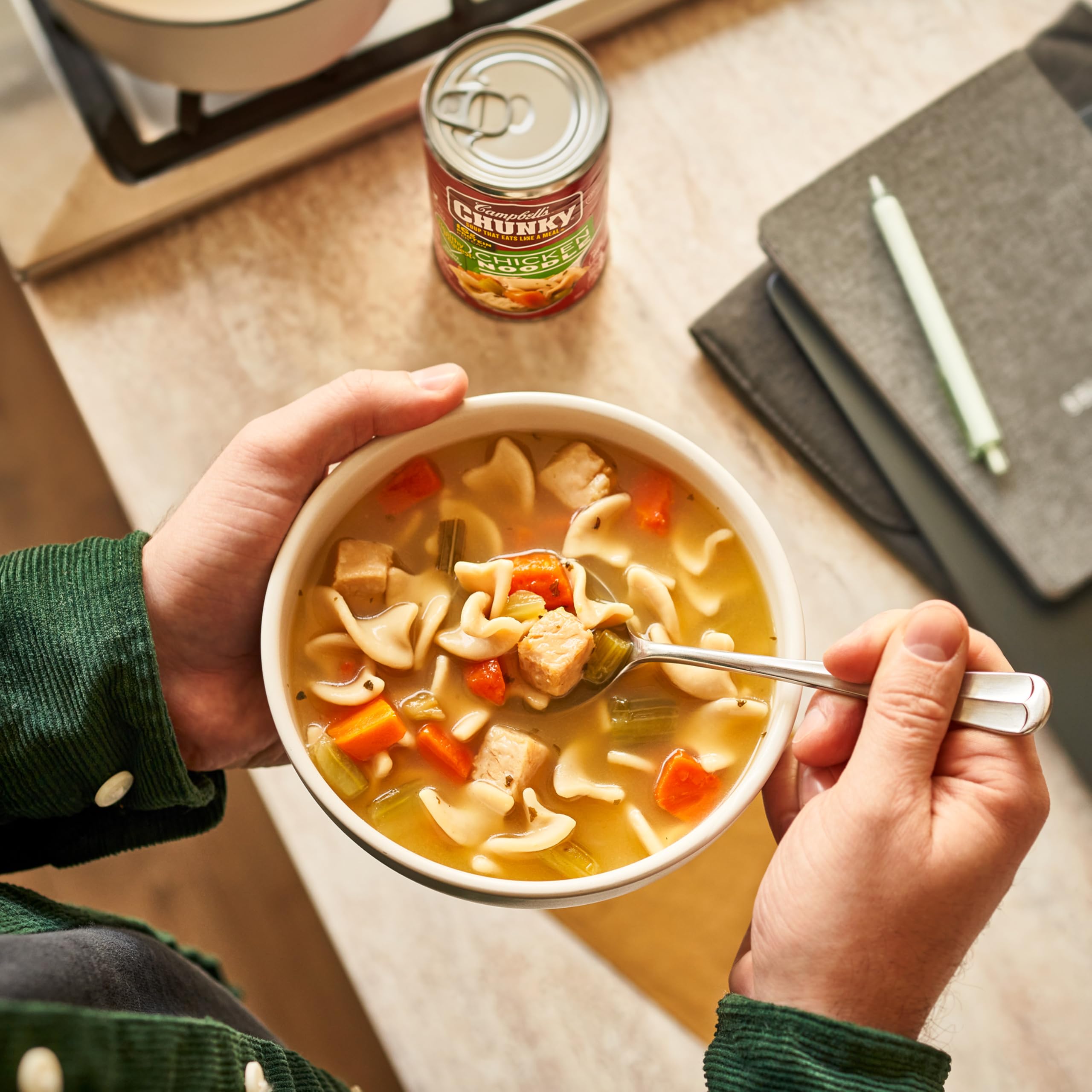 Campbell's Chunky Healthy Request Chicken Noodle Soup noodles detail and broth texture.