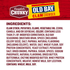 Campbell's Chunky Old Bay clam chowder warming on a campfire stove