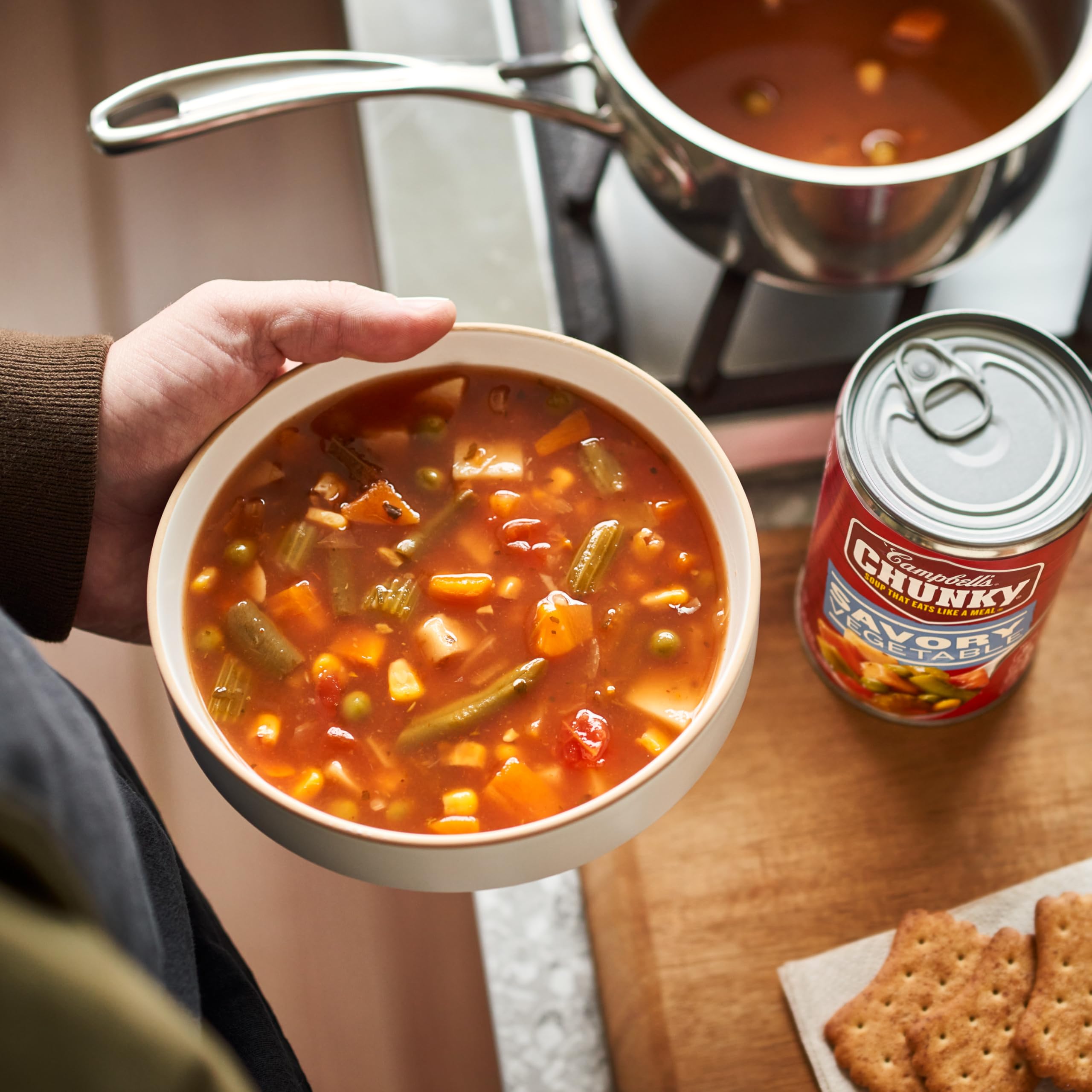 Close-up of Campbell's Chunky Savory Vegetable Soup ingredients showing fresh vegetables.