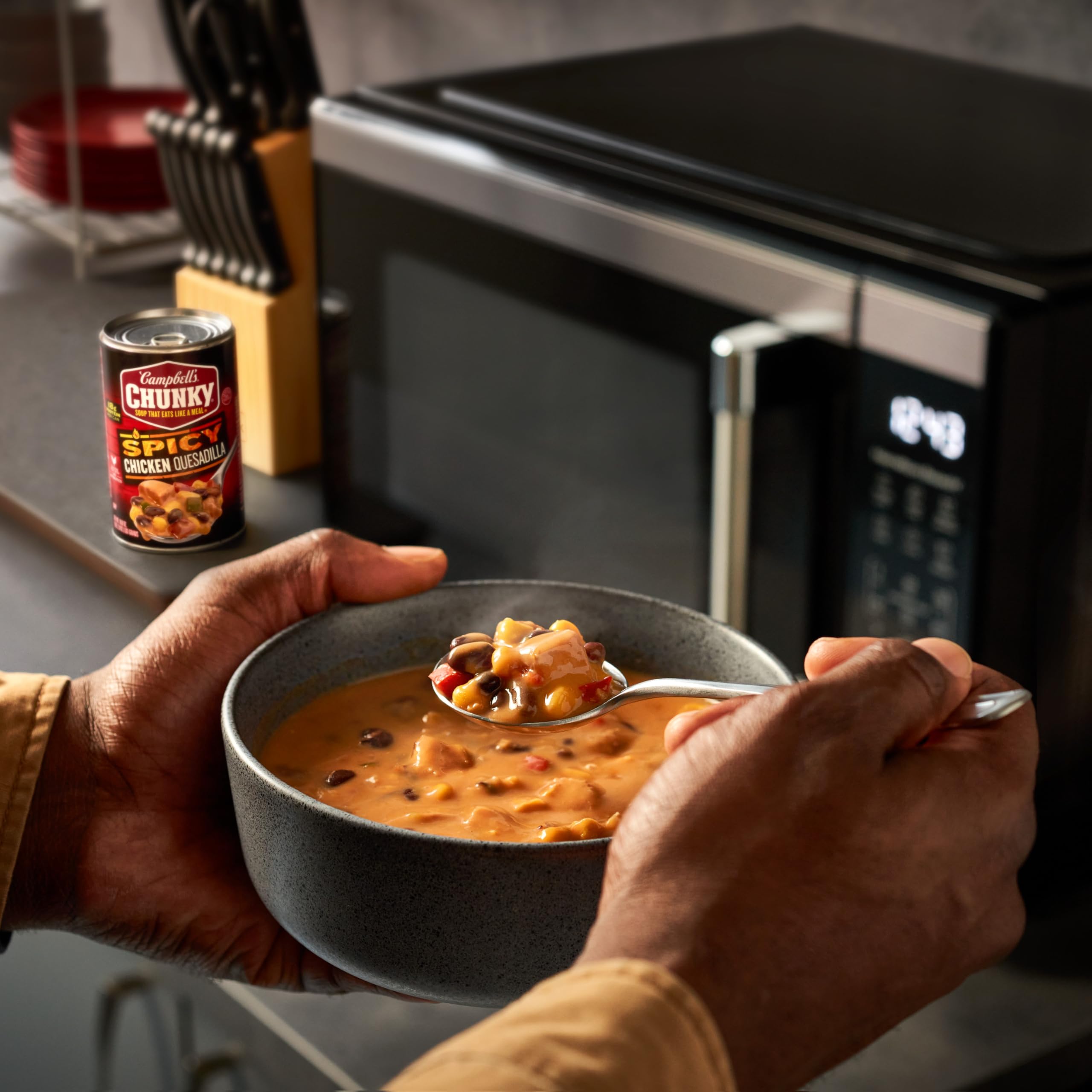 Campfire-ready Campbell's Chunky Spicy Chicken Quesadilla Soup warms on outdoor trips.