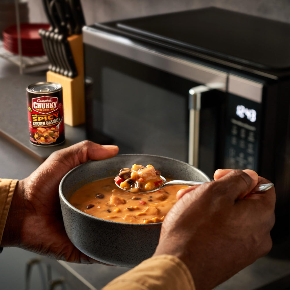 Campfire-ready Campbell's Chunky Spicy Chicken Quesadilla Soup warms on outdoor trips.