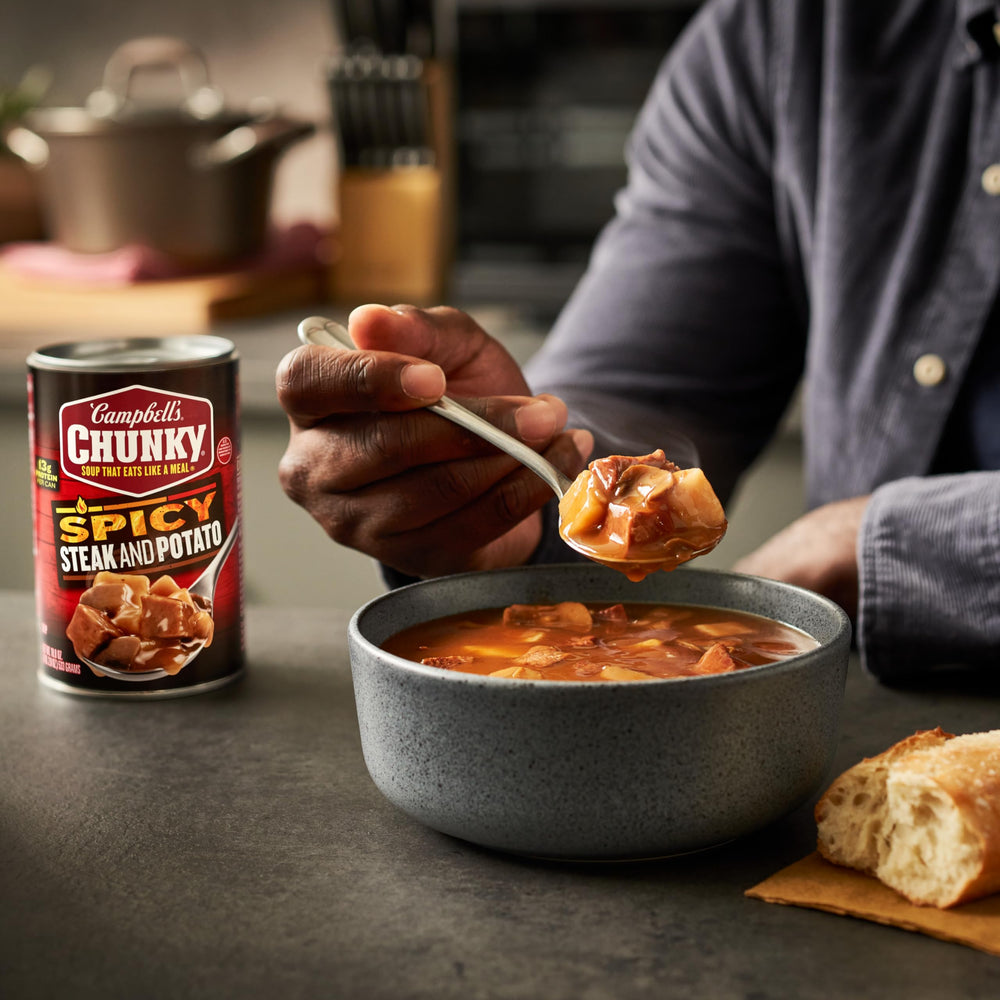 Campbell's Chunky Spicy Steak and Potato campfire serving, ideal for outdoor meals.