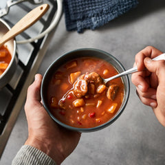 Serving bowl of Campbell's Chunky Texas-Style BBQ Burger soup ready to enjoy.