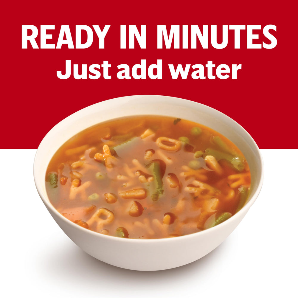 Herb garnish with Campbell's soup served beside crackers.