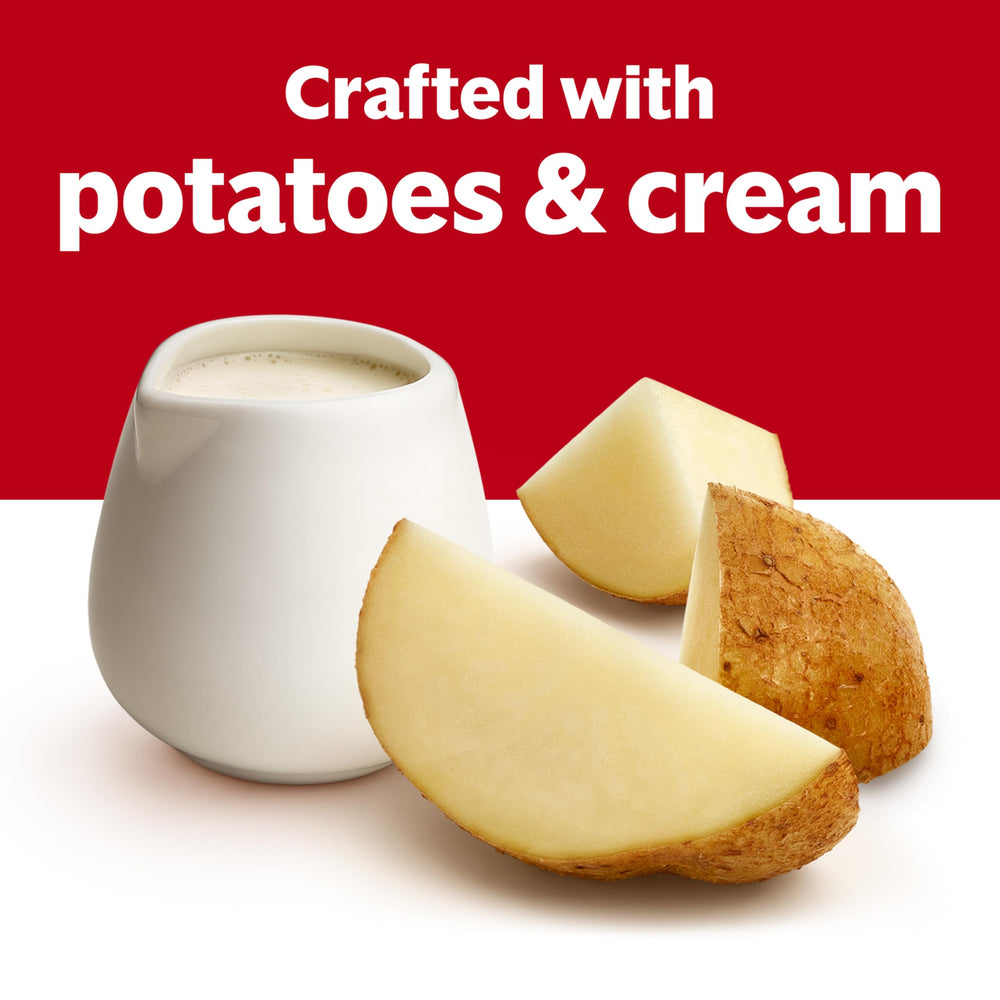 Campbell's Cream of Potato Soup bowl topped with herbs adds instant flavor and richness.