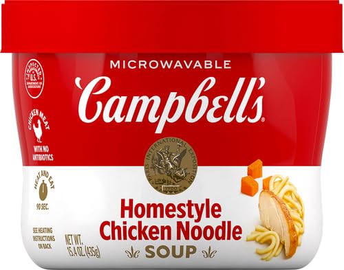 Campbell's Homestyle Chicken Noodle Soup bowl after microwaving, steam rising, ideal quick meal