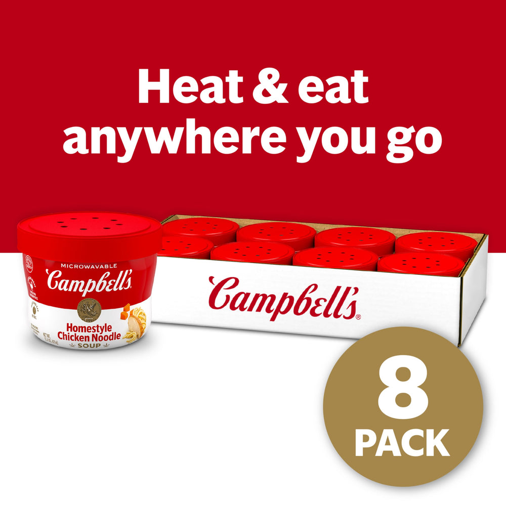 Campbell's Homestyle Chicken Noodle Soup vegetables broth closeup, savory and comforting.