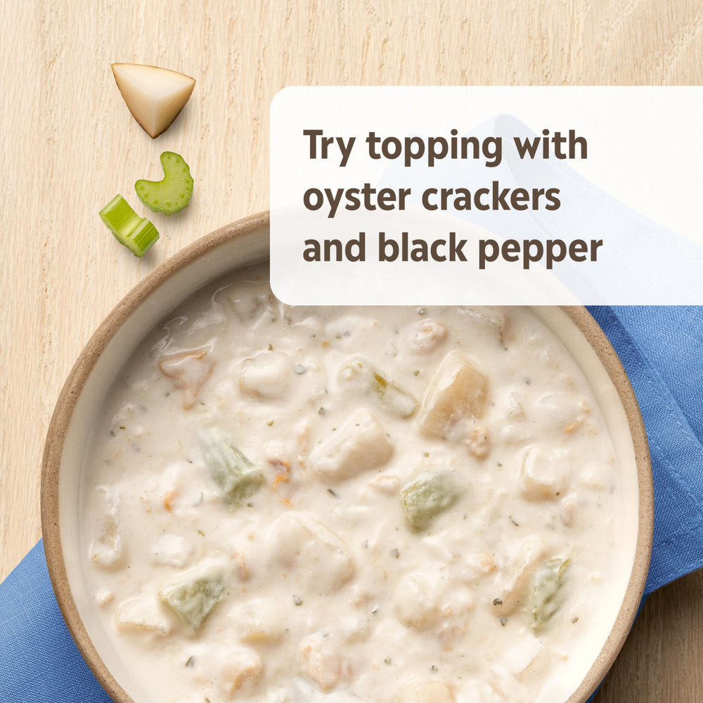 Campbell's Homestyle clam chowder ingredients close-up—savory clams and potatoes
