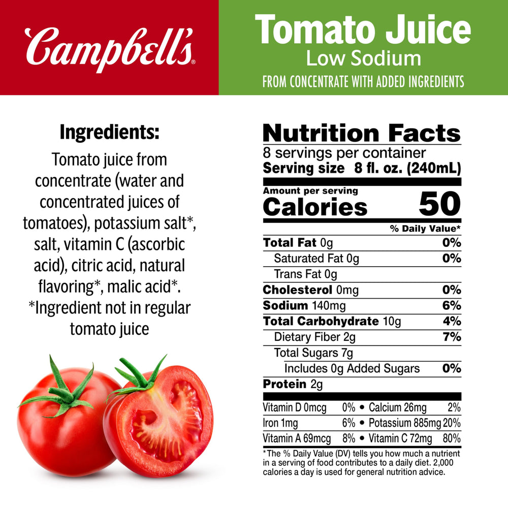 Pouring Campbell's Low Sodium Tomato Juice into a glass for a refreshing drink