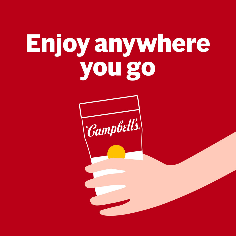 Campbell’s Sipping Soup held as an on-the-go snack in hand.