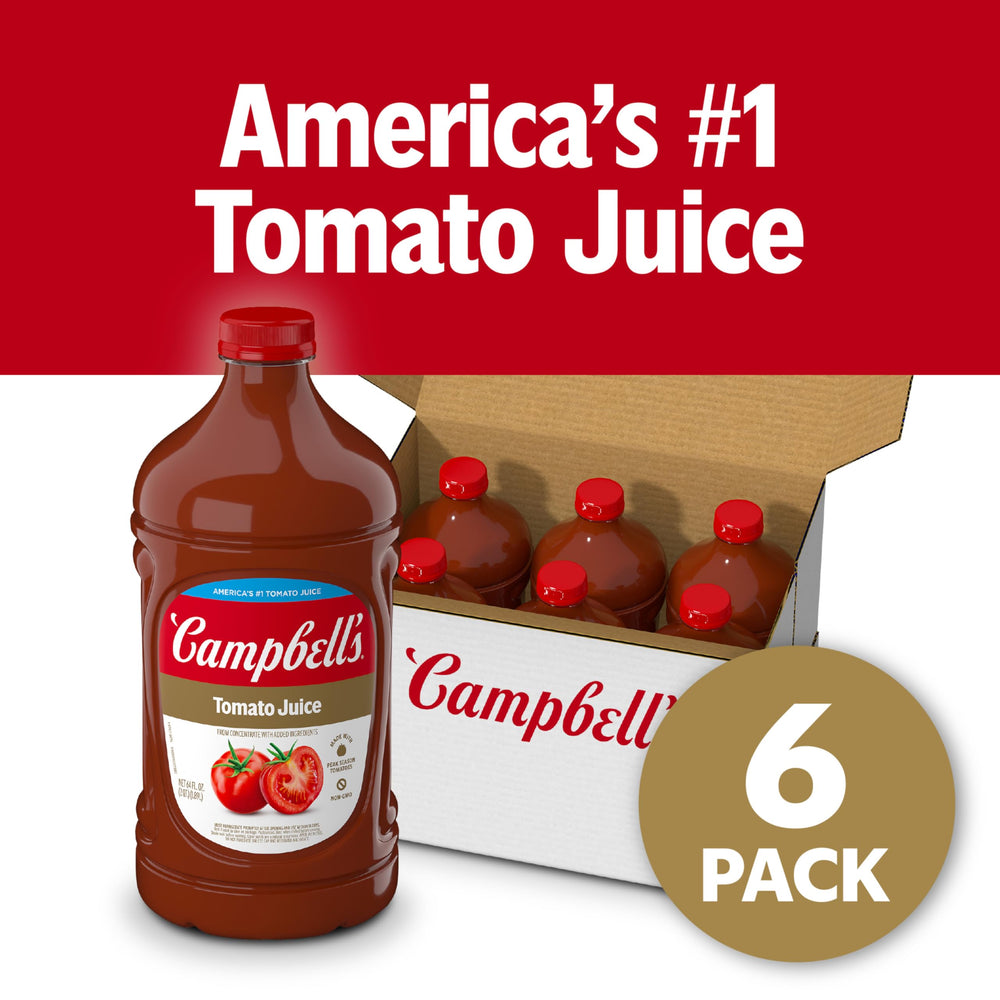 Campbell's tomato juice pouring into a glass, perfect for sipping.