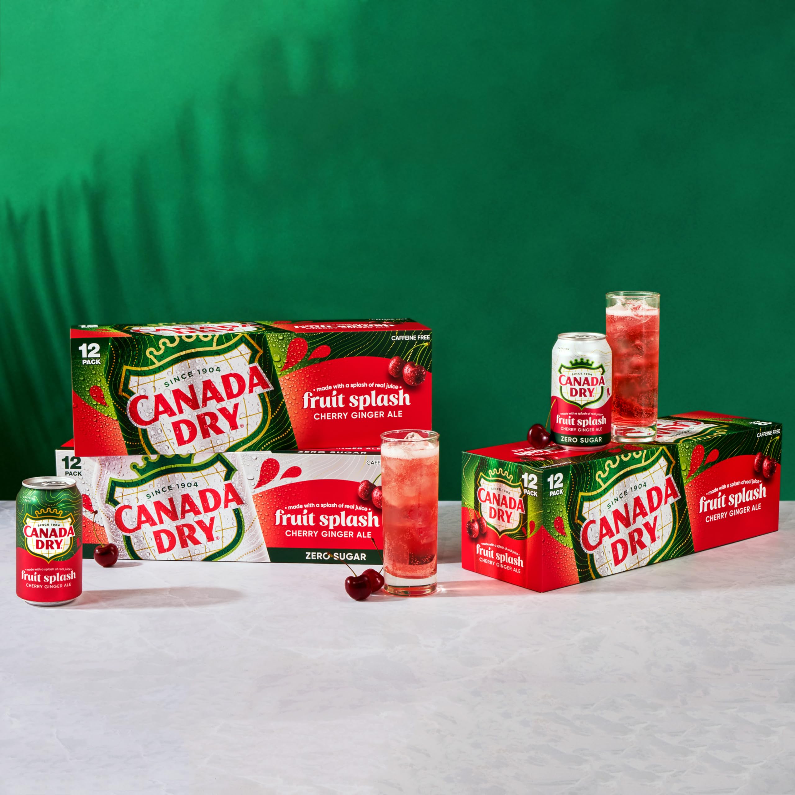 Canada Dry Fruit Splash Cherry Gingerale as a cocktail mixer beside a shaker.