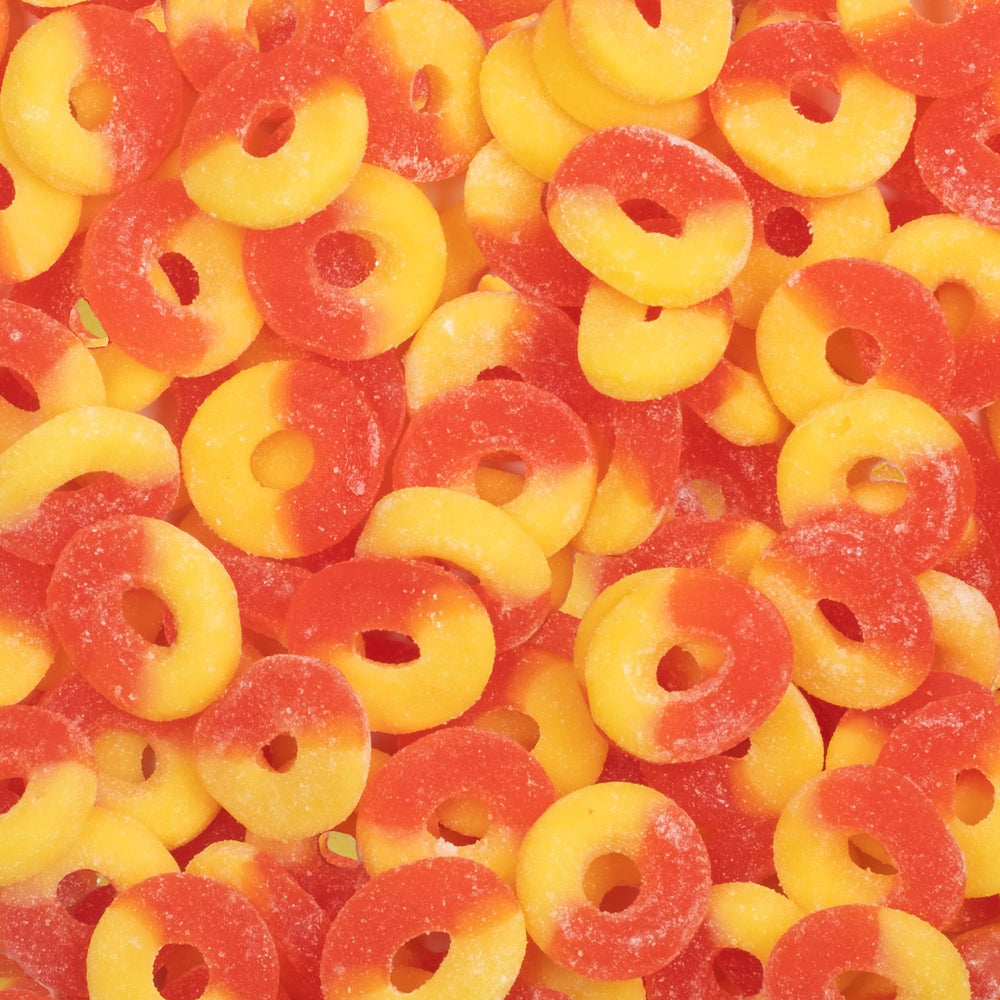 Close-up of Candy Break Peach Rings gummies highlighting peach flavor.