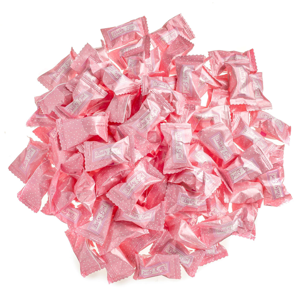 Candy Envy Baby Girl Buttermints on a party table for festive baby shower decor