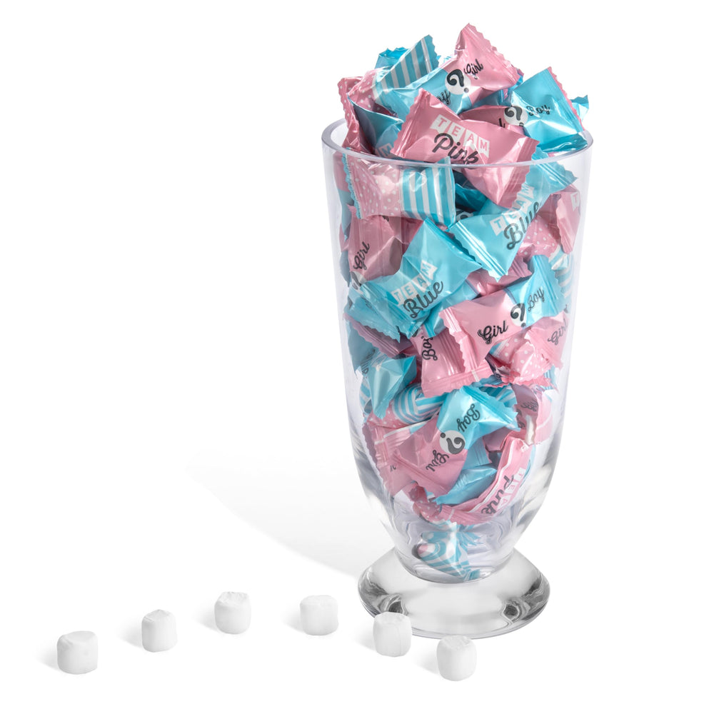 Candy Envy baby reveal mints on a charming table display for guests.