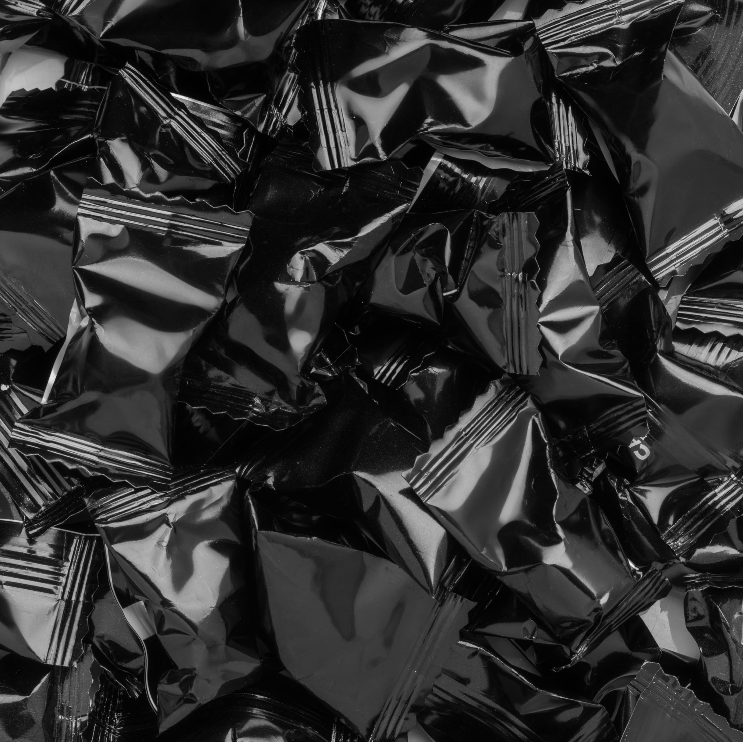 Candy Envy buttermints wrapper close-up highlighting black foil packaging